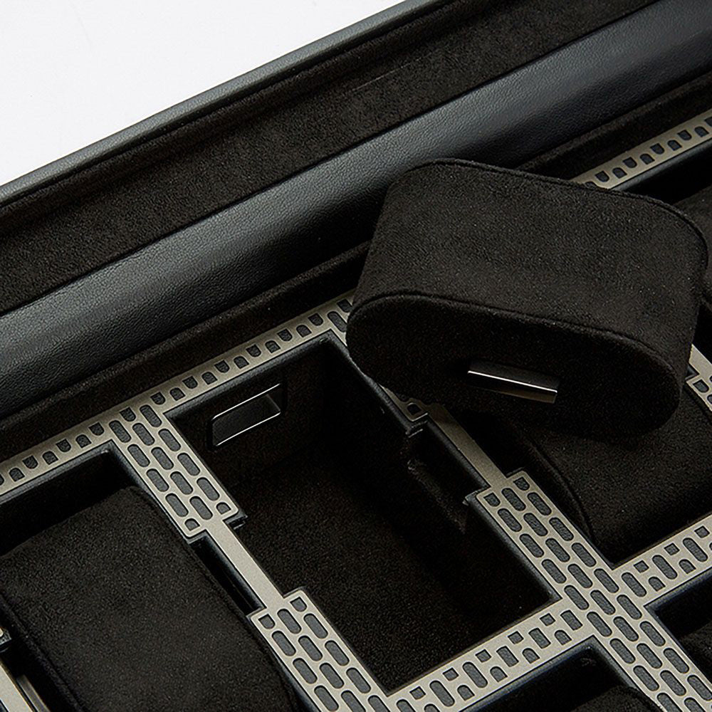 Close-up of the WOLF 1834 Axis 10 Piece Watch Box in black, showcasing its sleek modern design. The interior features multiple compartments with removable cushioned inserts, perfect for securely holding wristwatches or smart watches. It also provides optional lock and key security for added peace of mind.