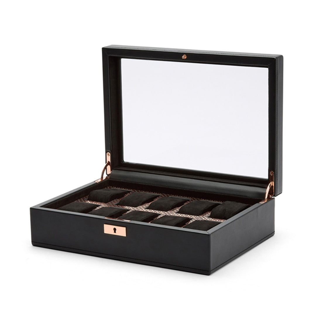 Discover the WOLF 1834 Axis 10 Piece Watch Box, designed for optimal watch storage with its black finish and transparent lid. This exquisite piece from WOLF features suspended watch cushions and multiple soft-lined compartments, ensuring your collection is displayed beautifully. For added security, a small front lock provides peace of mind with lock and key protection.