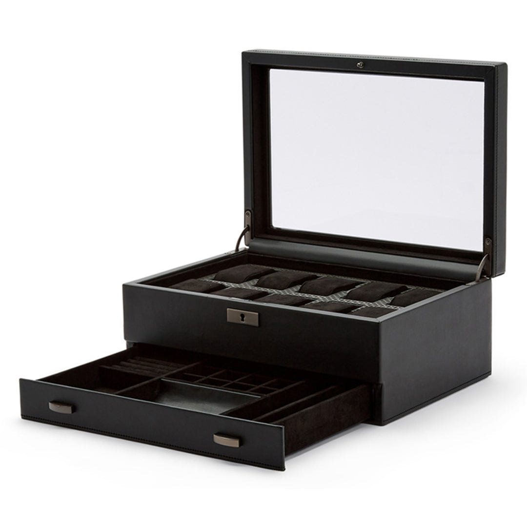 The WOLF 1834 Axis 10 Piece Watch Box with Drawer, by WOLF, features an elegant black leather design with a glass lid to showcase its multiple compartments for displaying watches. Additionally, it has a pull-out drawer offering extra sections for watch storage and accessories, all secured with a lock and key for added peace of mind.