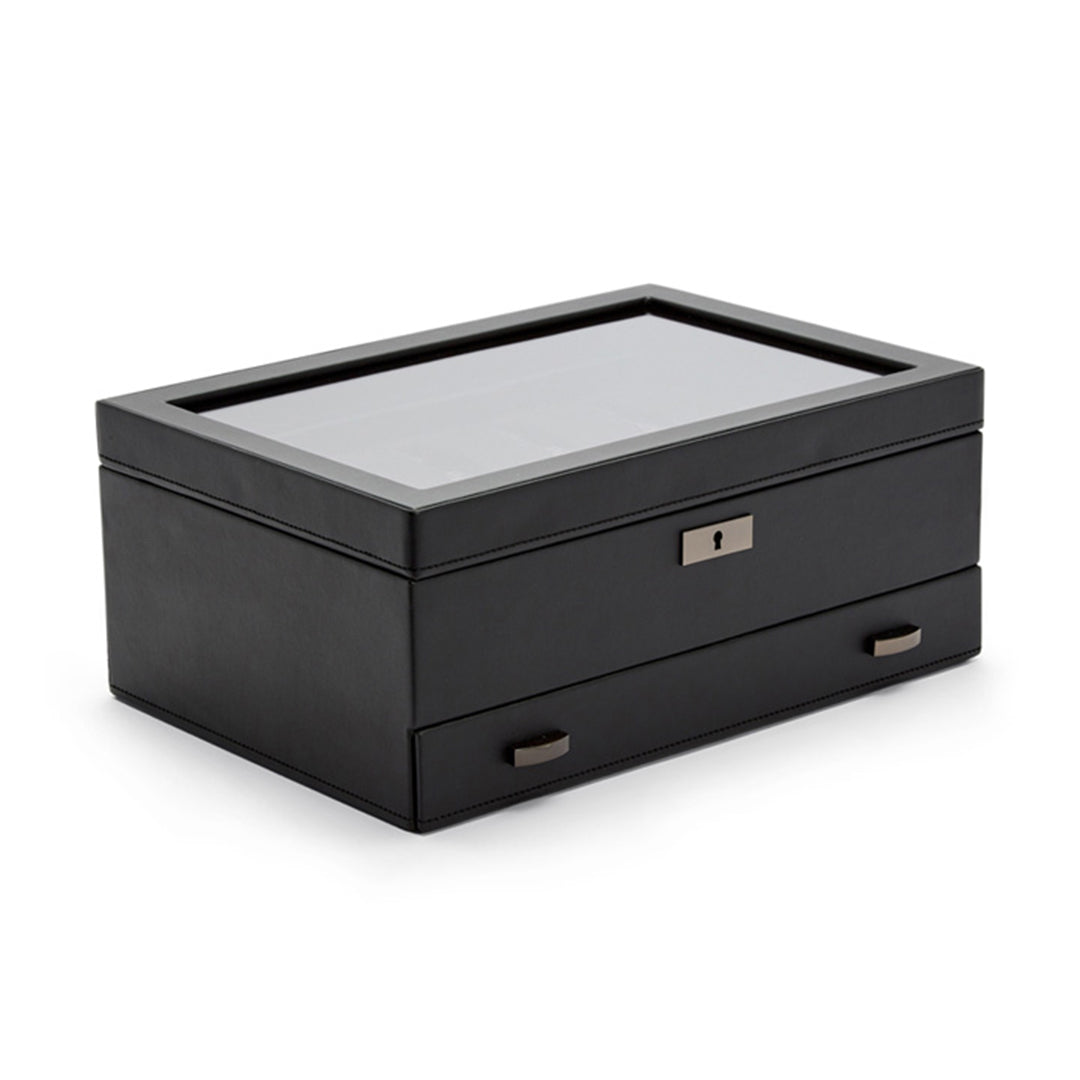 Introducing the WOLF 1834 Axis 10 Piece Watch Box with Drawer, a stylish black jewelry box by WOLF, complete with a glass top for visibility and secure lock and key protection. It includes two small handles on a lower drawer, making it ideal for storing watches.
