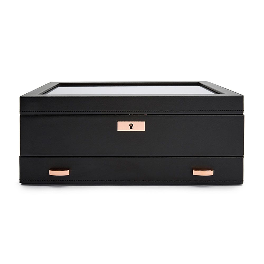 The WOLF 1834 Axis 10 Piece Watch Box With Drawer by WOLF is a sleek black rectangular case featuring a glass top, rose gold-tone lock and key for security, a smart watch USB port, and two matching handles on the lower drawer—ideal for elegant watch storage.