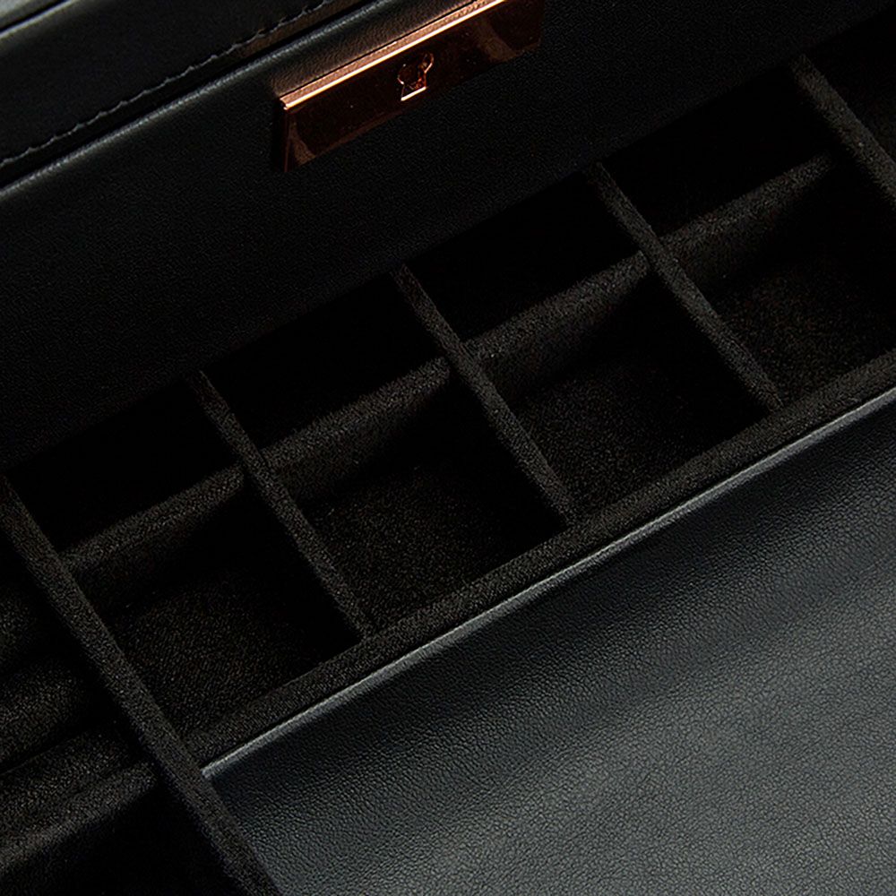 The WOLF 1834 Axis 10 Piece Watch Box With Drawer by WOLF features a sleek black leather design, multiple individual square compartments, and a top metallic latch—perfect for securely organizing and elegantly displaying your watch collection.