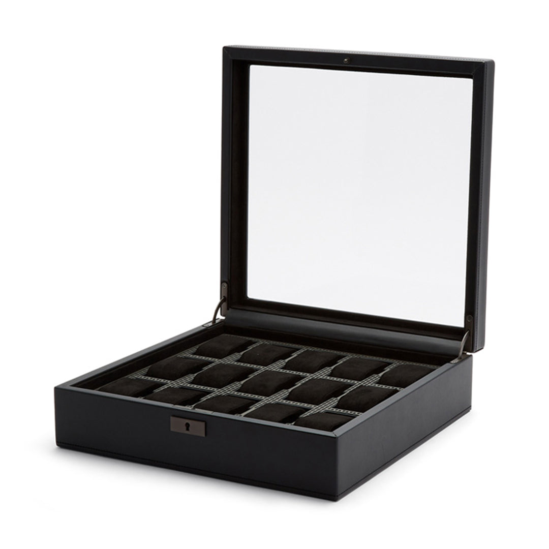 The WOLF 1834 Axis 15 Piece Watch Box by WOLF features a transparent lid and multiple square compartments lined in black velvet, offering an elegant solution for watch storage. Designed to store and display your prized smart watch collection, this box ensures security with a lock and key system.
