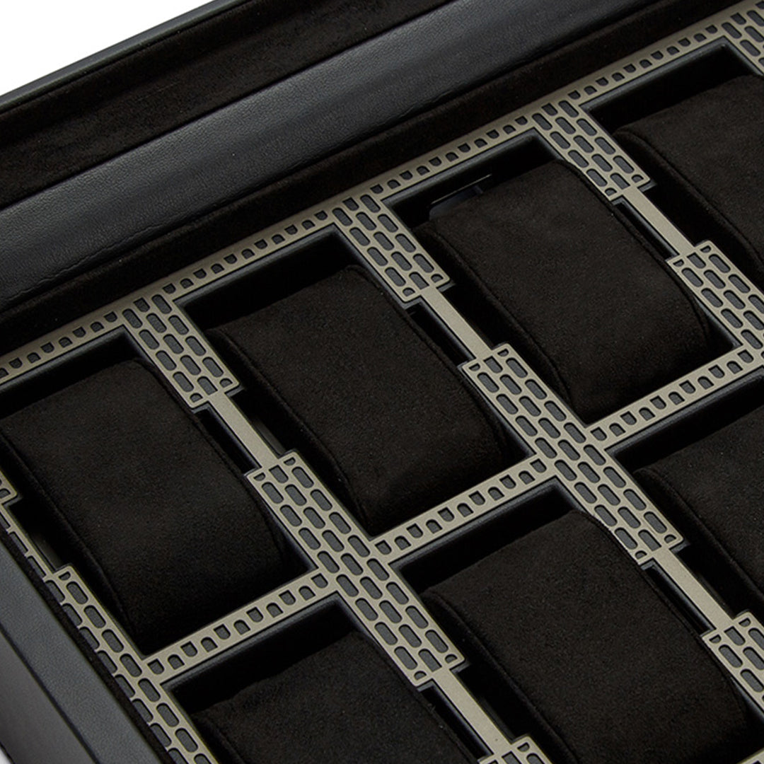 This close-up showcases the WOLF 1834 Axis 15 Piece Watch Box, designed in sleek black with fifteen cushioned slots, each separated by a unique metal grid design. Featuring a soft interior for secure watch storage, it also includes lock and key security for enhanced peace of mind.
