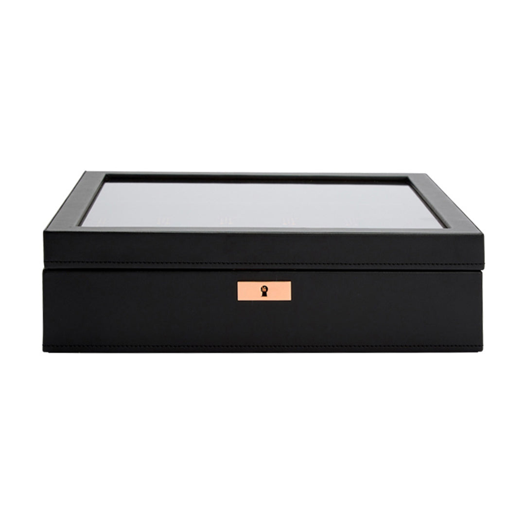 The WOLF 1834 Axis 15 Piece Watch Box is a stylish, black rectangular storage solution, featuring a transparent lid and a subtle gold keyhole on the front, perfectly combining lock and key security for both display and storage purposes.