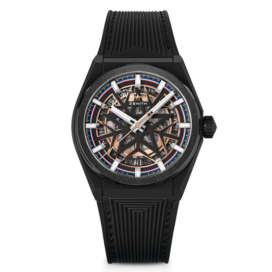 The ZENITH Defy Classic Elite 670 SK 41mm Watch is a black ceramic watch with a skeleton dial revealing intricate mechanics. It features rose gold and silver accents, white hour markers and hands, a textured black strap, and the "Zenith" logo on the face. Part of the DEFY Classic Fusalp collection.