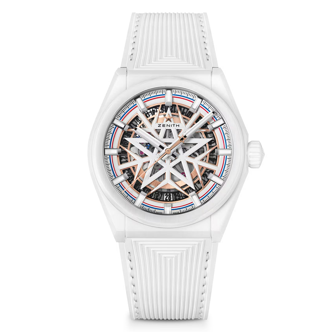 The ZENITH Defy Classic Elite 670 41mm Watch by Zenith is a white ceramic timepiece with an intricate skeleton dial displaying exposed gears. It features an Elite automatic movement and sleek case and strap with fine grooves, while the watch hands prominently stand out.