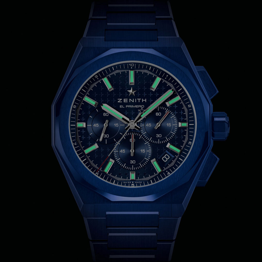 The Zenith Defy Skyline Chronograph 160th Anniversary Limited Edition El Primero 3600 42mm features a dark blue dial, matching metal band, glowing green markers and hands, plus three subdials—a striking timepiece for enthusiasts.
