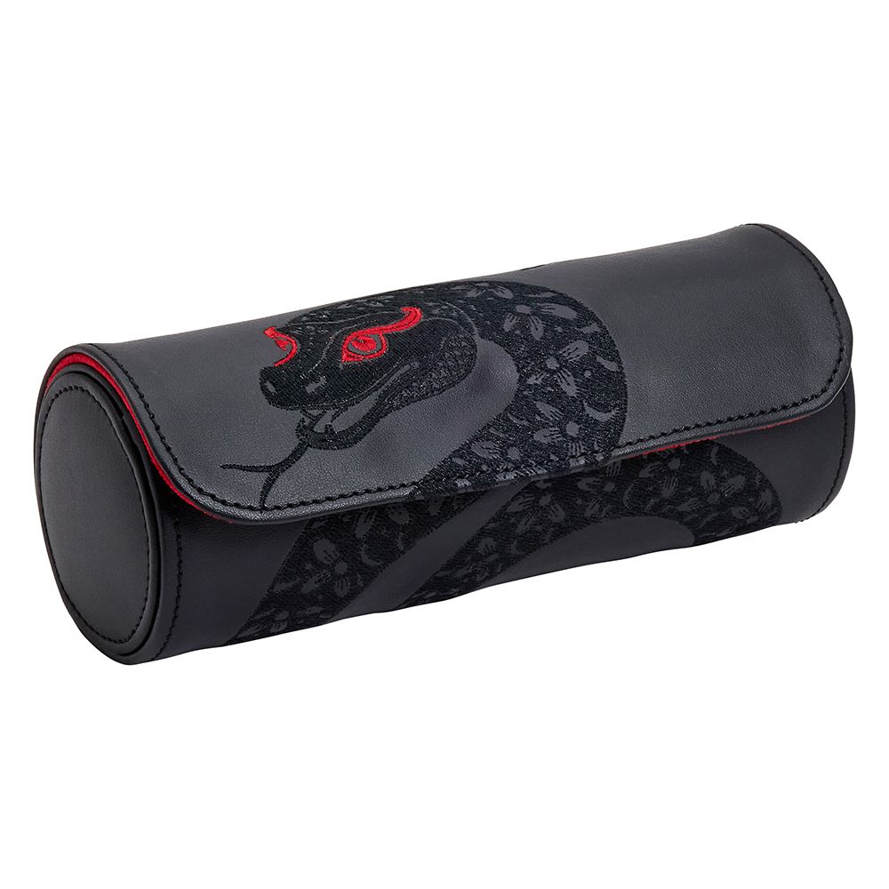 The WOLF 1834 Lunar Triple Watch Roll is a black leather cylindrical case featuring a red-accented stylized snake with red eyes and intricate patterns on the lid. This WOLF special edition has a secure flap closure, perfect for Chinese New Year gifting.