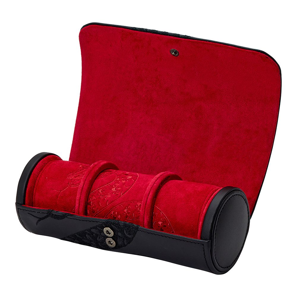 The WOLF 1834 Lunar Triple Watch Roll by WOLF is a black cylindrical case with a red velvet interior, multiple sections for jewelry, and two front snap buttons—a stylish special edition gift ideal for any occasion.