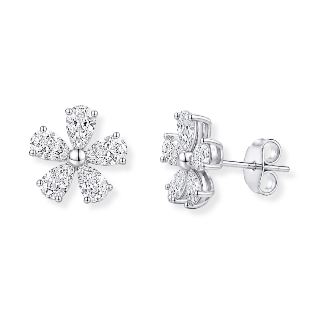 The Raffi&Co.® 18K White Gold Diamond Stud Earrings feature a pair of elegant, five-petal flower-shaped studs from Raffi&Co, with each petal adorned with brilliant white diamonds in sophisticated diamond shapes totaling 1.15 CTW, beautifully displayed against a white background.