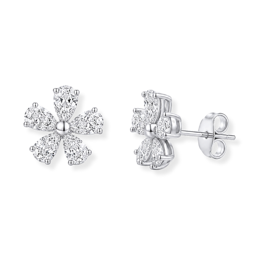 The Raffi&Co.® 18K White Gold Diamond Stud Earrings feature a pair of elegant, five-petal flower-shaped studs from Raffi&Co, with each petal adorned with brilliant white diamonds in sophisticated diamond shapes totaling 1.15 CTW, beautifully displayed against a white background.
