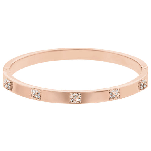 The Swarovski Rose Gold Plated Tactic Bangle is perfect for achieving a stacked look around your wrist, featuring diamond-like studs for added elegance.