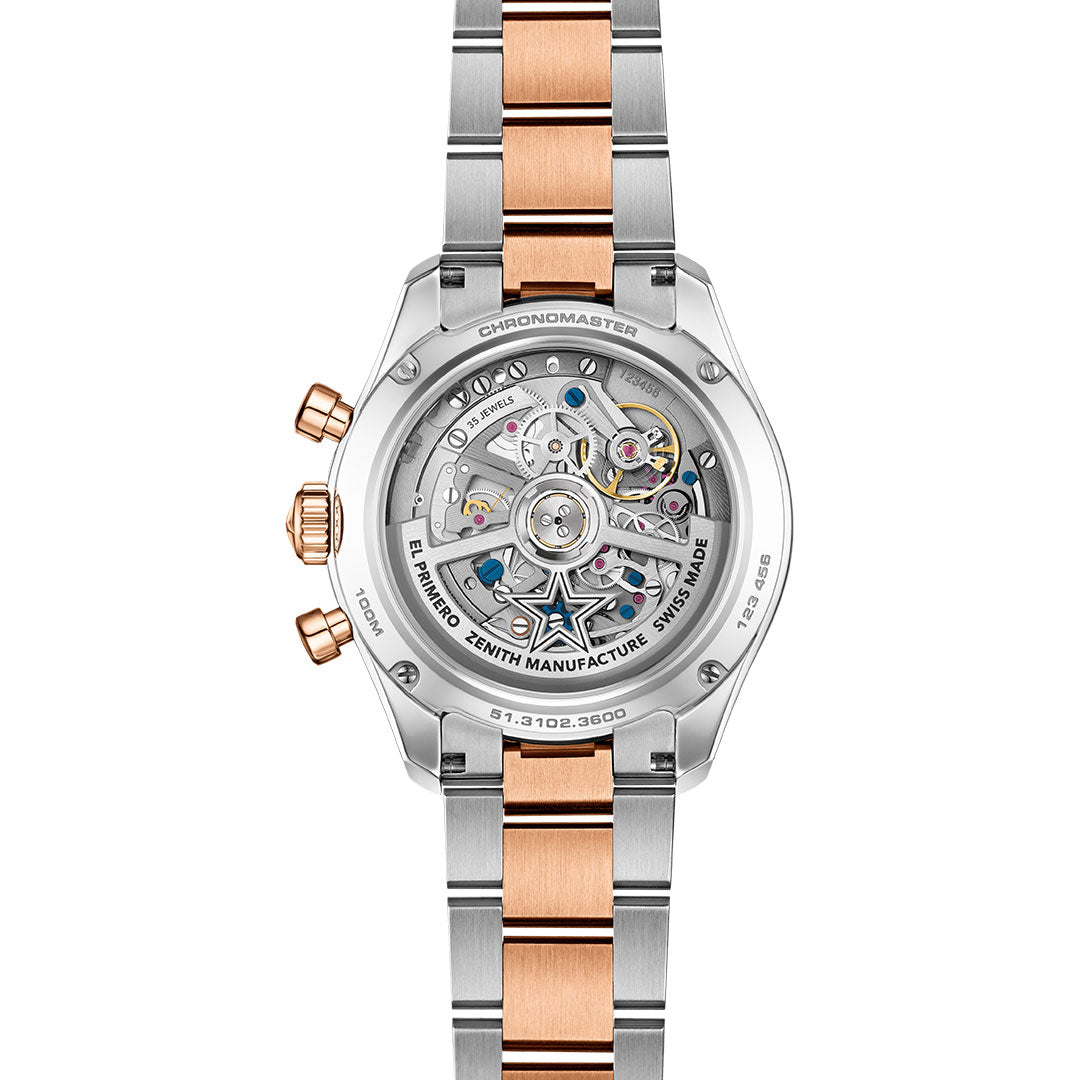 The Zenith Chronomaster Sport El Primero 3600 Automatic Chronograph 41mm Watch showcases a transparent case back revealing its movement, with a silver and rose gold link strap and engraved chronograph details on the outer rim.