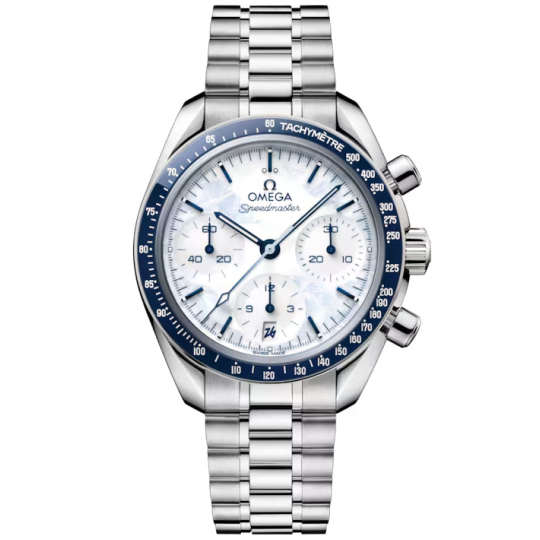 The OMEGA Speedmaster 38 Co-Axial Chronometer Chronograph 38mm Milano Cortina 2026 Edition features a stainless steel case, blue tachymeter bezel, white dial with three subdials, blue hands and accents, and a metal link bracelet.