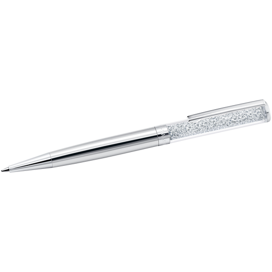 Introducing the Swarovski Crystalline Ballpoint Pen, a sophisticated writing instrument by Swarovski. Featuring a sleek silver design with a textured grip section and a shiny metallic finish, it's elegantly adorned with subtle crystals. This modern pen comes with a pointed tip and has a convenient clip on the cap, making it an exquisite gift for any occasion.