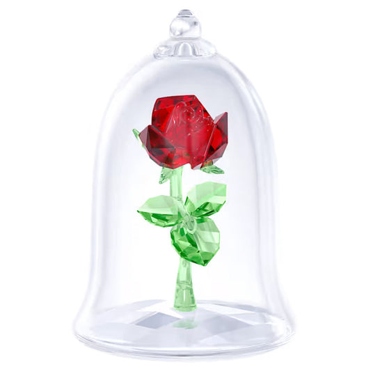 The Swarovski Beauty and the Beast Enchanted Rose Home Décor, from the renowned brand Swarovski, features a detailed crystal rose with green leaves encased in a transparent glass bell jar. Its upright stance and shimmering allure make it an enchanting piece reminiscent of Beauty and the Beast, perfect for Disney collectors.