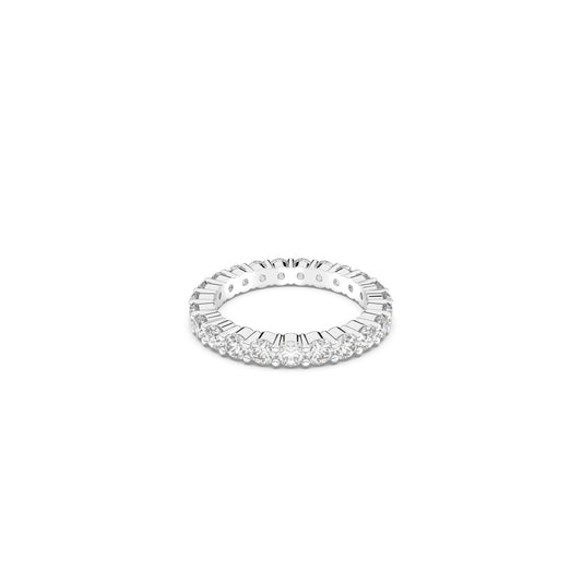 The Swarovski Vittore XL Round Cut Ring is a sophisticated piece from Swarovski, showcasing a silver eternity design with clear, sparkling stones set in a sleek, polished rhodium-plated band. This creates a symmetrical and elegant appearance featuring uniformly sized clear stones that form an endless circle.