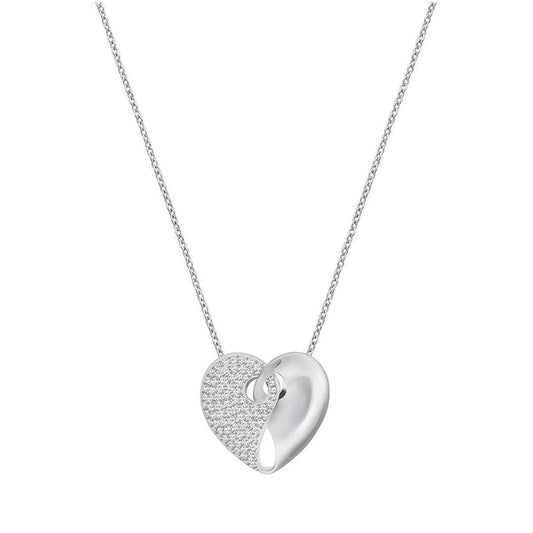 The Swarovski Guardian Heart Necklace Pendant features a heart-shaped design. One side is smooth, while the other is adorned with shimmering crystals, creating an eye-catching contrast. Its delicate and thin chain adds to its elegance.