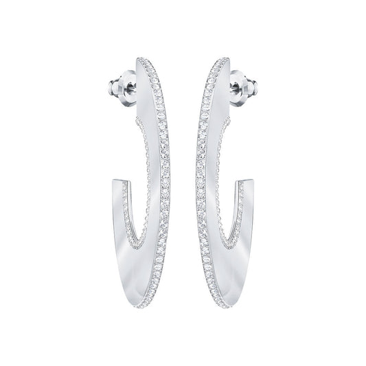 Presenting the Swarovski Gelane Hoop Earrings: a stunning pair of elegant silver hoops adorned with small, sparkling white crystals along the outer edges. These beautifully designed earrings feature a slight twist, offering a modern and sophisticated appearance. They are showcased against a pristine white backdrop to highlight their exquisite craftsmanship.