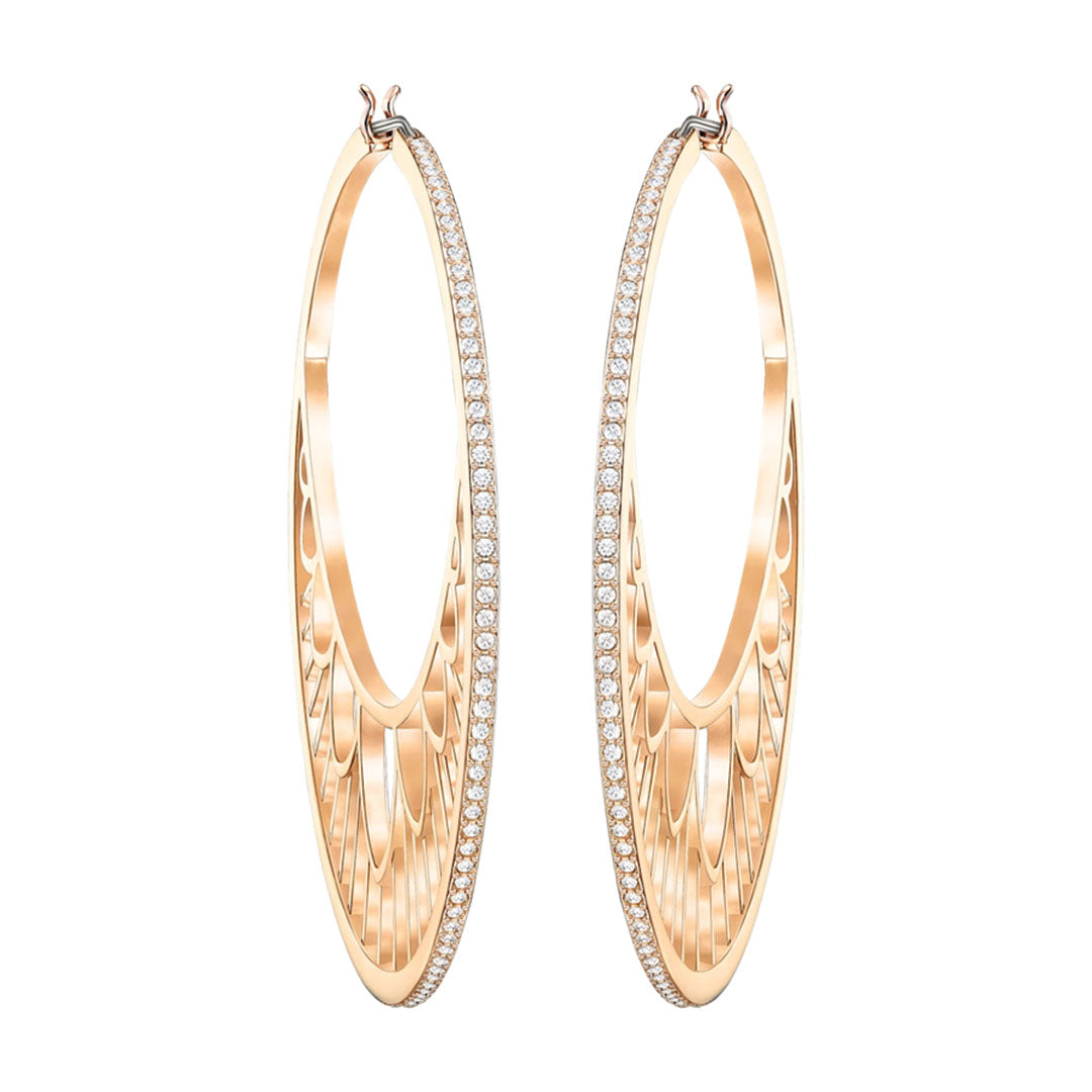 Introducing the Swarovski Georgette Hoop Earrings by Swarovski: a pair of elegant gold hoops, each beautifully adorned with a row of sparkling crystals along the outer edge. The inner surface showcases an intricate cut-out design, adding sophistication and style to your look.