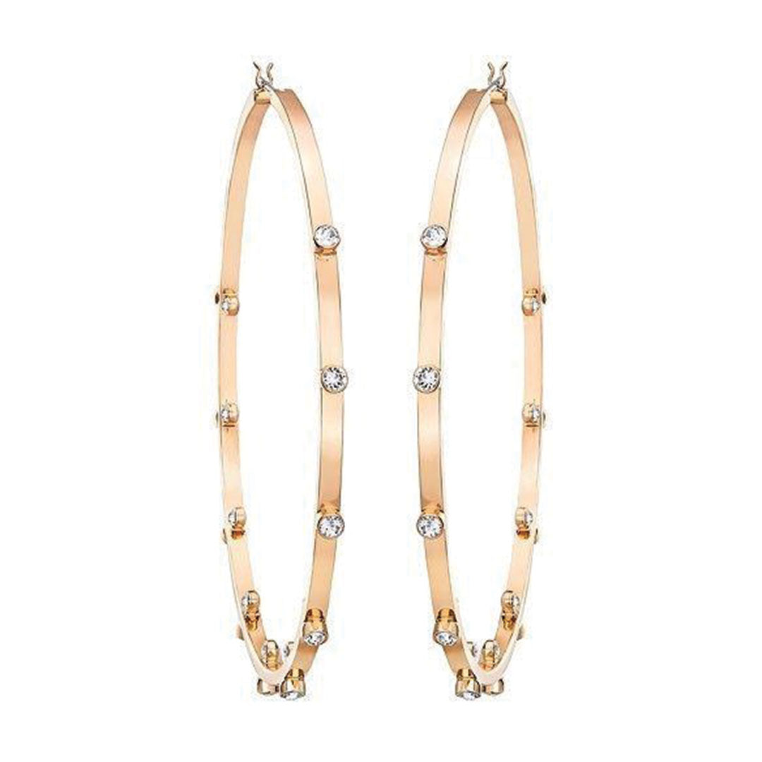 Swarovski's Genna Hoop Earrings, featuring gold hoops adorned with small, evenly spaced crystals, set against a white background.