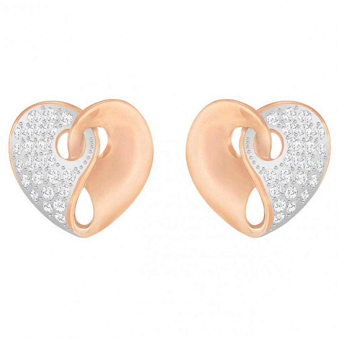 Introducing the Swarovski Guardian Heart Stud Earrings by Swarovski: a captivating pair of heart-shaped earrings featuring a unique split design. One side gleams with rose gold tones, while the other sparkles with pavé crystals, creating a harmonious and enchanting look.