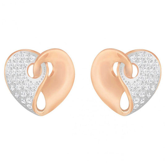 Introducing the Swarovski Guardian Heart Stud Earrings by Swarovski: a captivating pair of heart-shaped earrings featuring a unique split design. One side gleams with rose gold tones, while the other sparkles with pavé crystals, creating a harmonious and enchanting look.