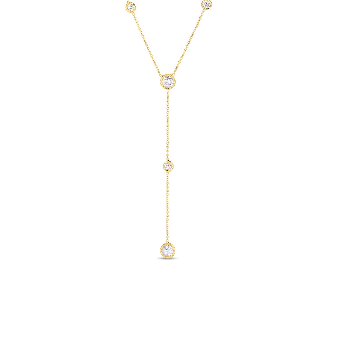 The Roberto Coin Diamonds By The Inch 18K Yellow Gold Five Station Y Necklace showcases a sophisticated style with five round diamonds in a bezel setting that gradually increase in size towards the bottom, capturing the minimalist elegance reminiscent of Roberto Coin's iconic designs.