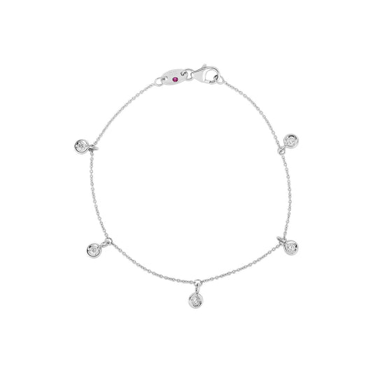 The Roberto Coin Diamonds By The Inch 18K White Gold Dangling Five Station Bracelet is an exquisite piece featuring five round diamond charms, elegantly suspended along the chain.