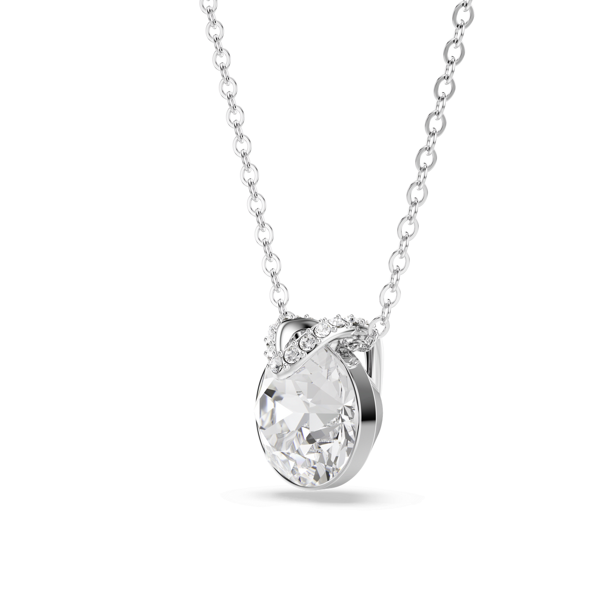 A silver chain necklace showcasing the Swarovski BELLA PENDANT by Swarovski, featuring a large round-cut clear gemstone pendant accented with a delicate row of tiny sparkling stones set in a twisted design above the main gem—a brilliant style inspired by timeless elegance, available at Raffi Jewellers and Swarovski Canada.