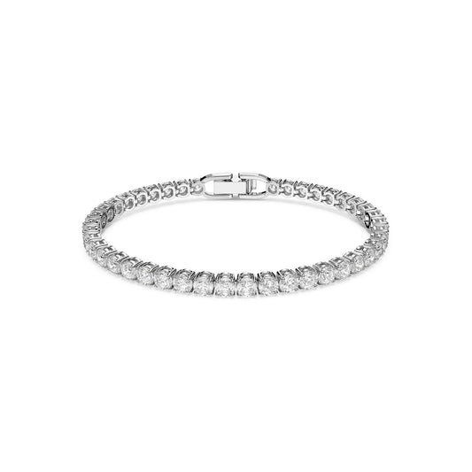The Swarovski Round cut Tennis Deluxe Bracelet, crafted by Swarovski, features a continuous line of round, clear zirconia gemstones set on a sleek silver band. The rhodium-plated metal adds extra shine and the bracelet is secured with a secure clasp.