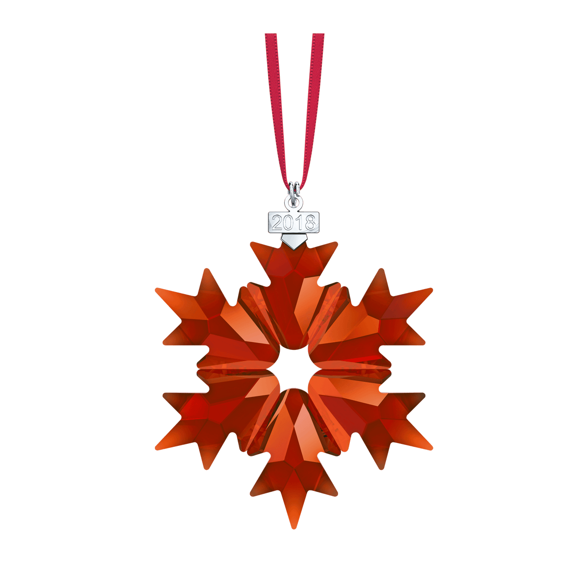 A Swarovski Holiday Ornament A.E. 2018—a red crystal snowflake from the renowned Swarovski brand—hangs from a red ribbon with a silver “2018” tag against a white background, available at Raffi Jewellers, an authorized Swarovski Canada retailer.