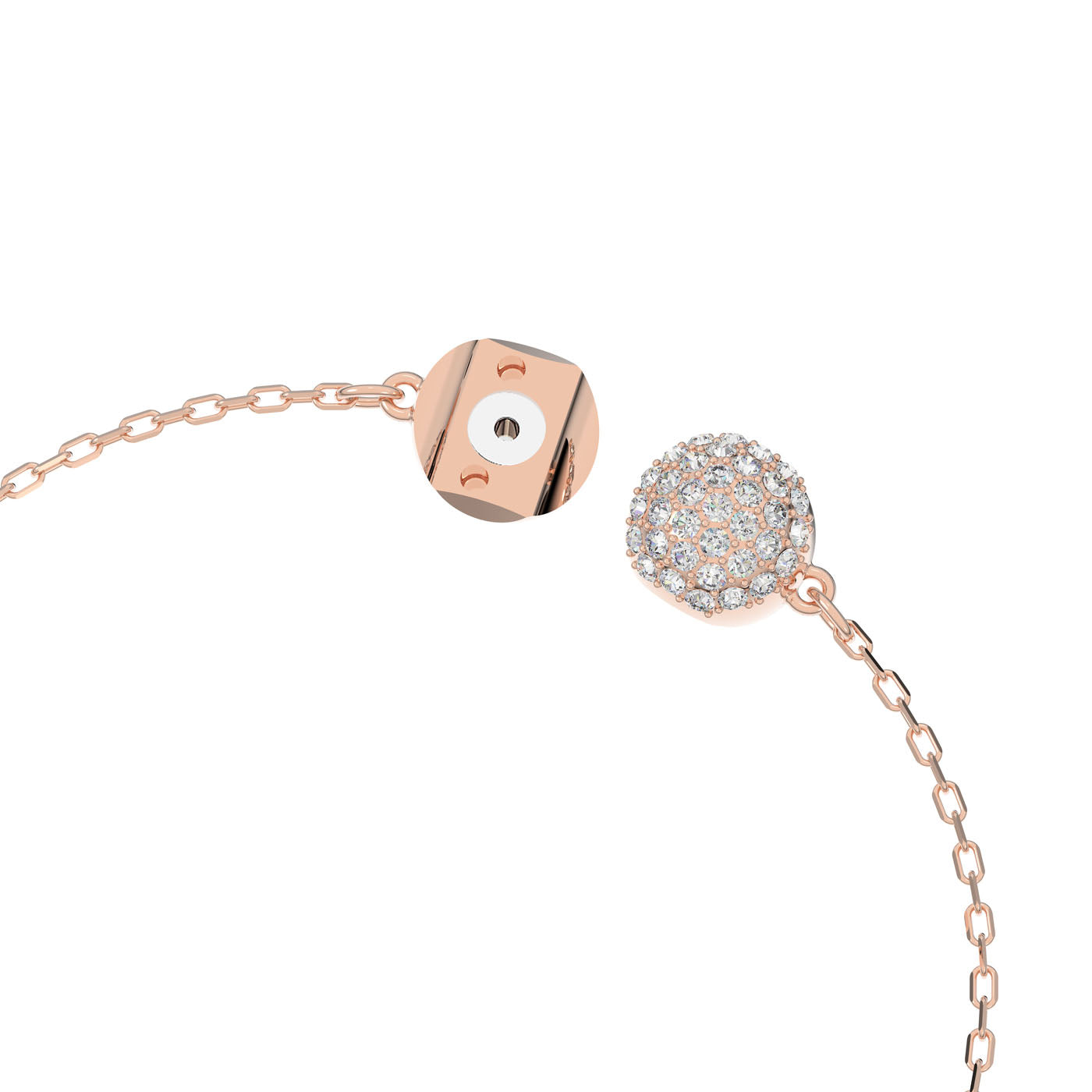 A close-up of the Swarovski Rose Gold Dazzling Swan Bracelet, featuring a magnetic closure. One end is adorned with a small bead embellished with crystals, while the other end has a smooth, reflective finish. These ends are connected by a delicate chain that radiates elegance and sophistication.