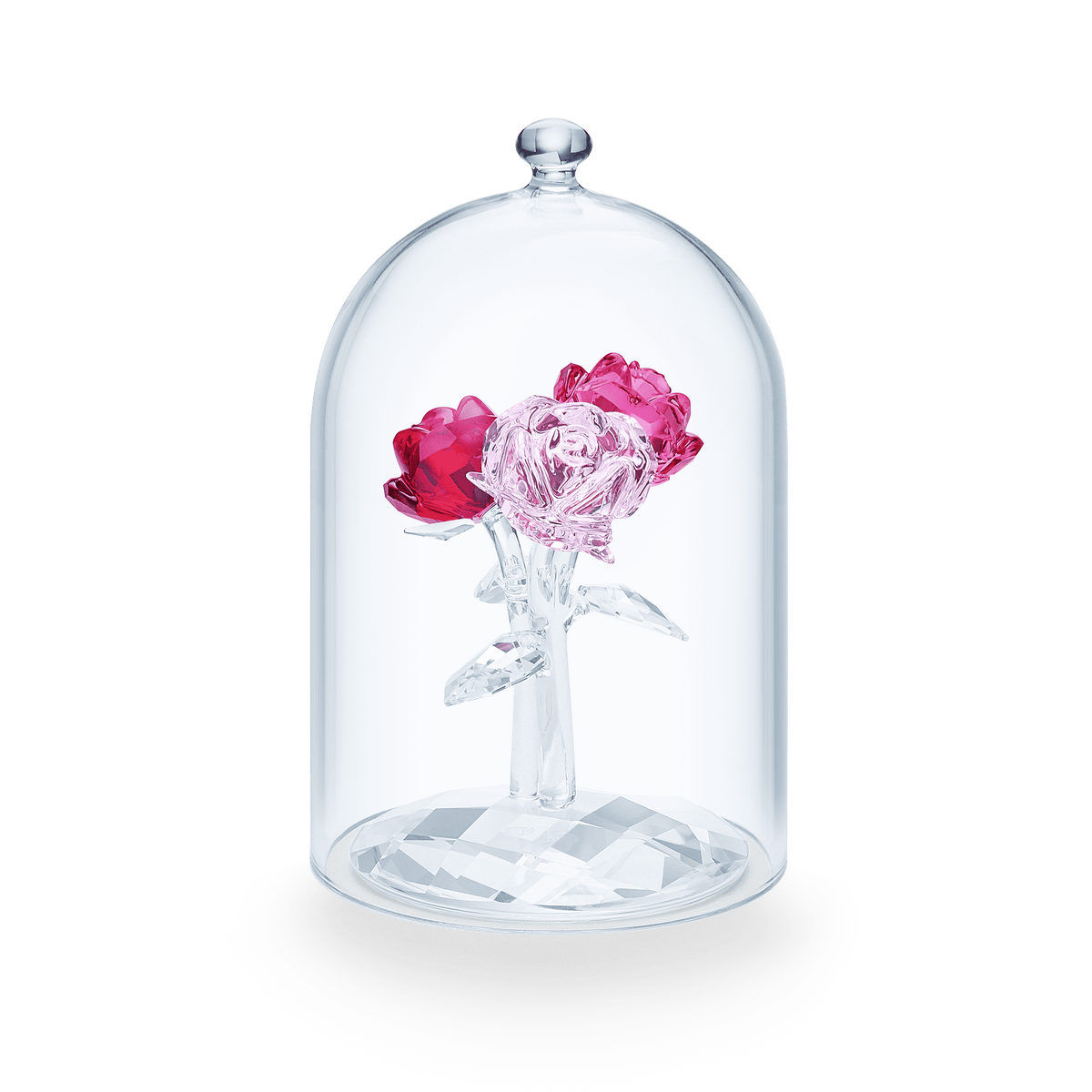 Displayed under a transparent glass dome on a faceted glass base, the Swarovski Rose Bouquet by Swarovski features two exquisite glass roses—one pink and one red—with clear glass stems and leaves, capturing timeless elegance.