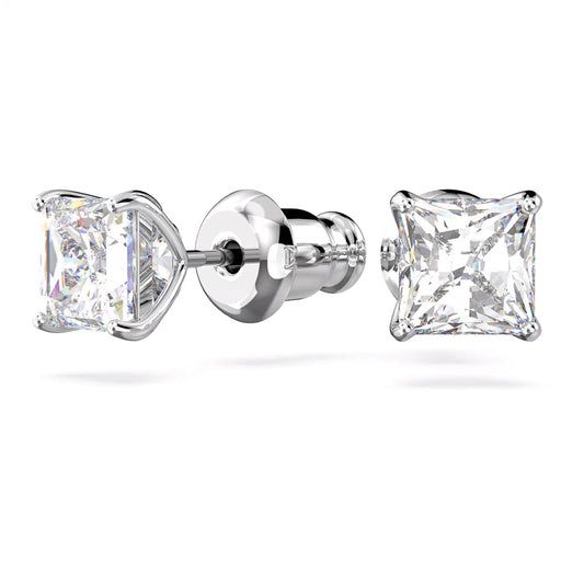 Introducing the Swarovski Stilla Attract Stud Earrings, crafted by Swarovski. These stunning stud earrings feature square-cut diamonds set in rhodium-plated prongs, showcasing their facets and brilliance. They are secured with butterfly push backs for a reliable fit.