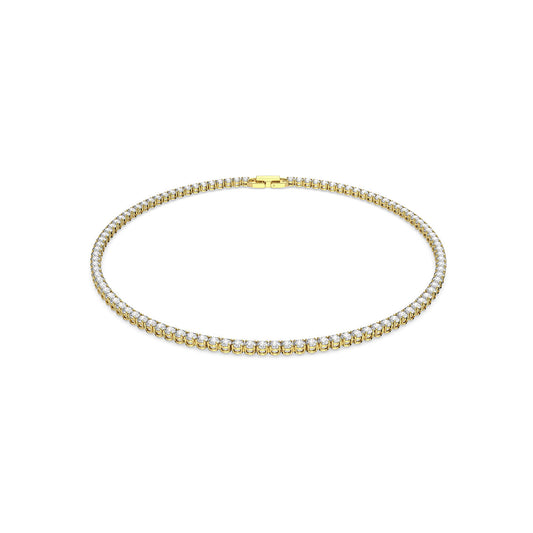 A Swarovski Round Cut Tennis Deluxe Necklace and Earrings Set, featuring a gold-tone necklace adorned with evenly spaced, glittering diamonds set against a plain white background. The piece offers a secure clasp and embodies a classic, elegant design.