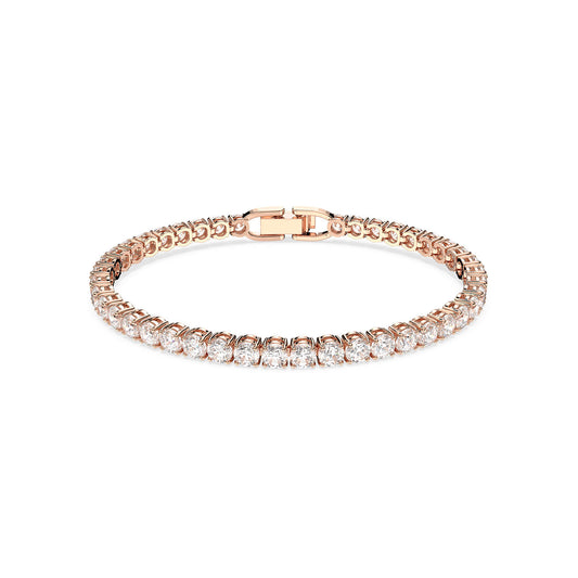 The Swarovski Round Cut Tennis Deluxe Bracelet, crafted by Swarovski, is ideal for everyday wear with its rose gold tone complemented by a series of round-cut crystals set in prong settings. Its secure clasp and sleek, elegant design are beautifully highlighted against a plain white background.