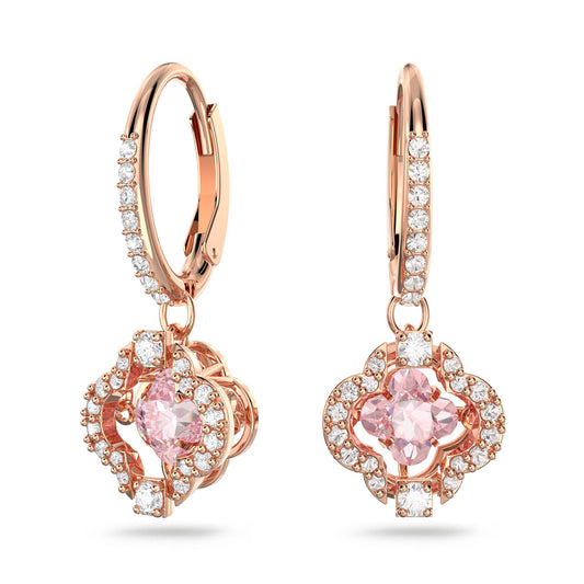The Swarovski Sparkling Dance Drop Earrings by Swarovski showcase a stunning floral design in rose gold, featuring pink stones and clear gemstones. The central pink stone is elegantly surrounded by a pattern of sparkling clear stones, adding sophistication and charm to these exquisite earrings.
