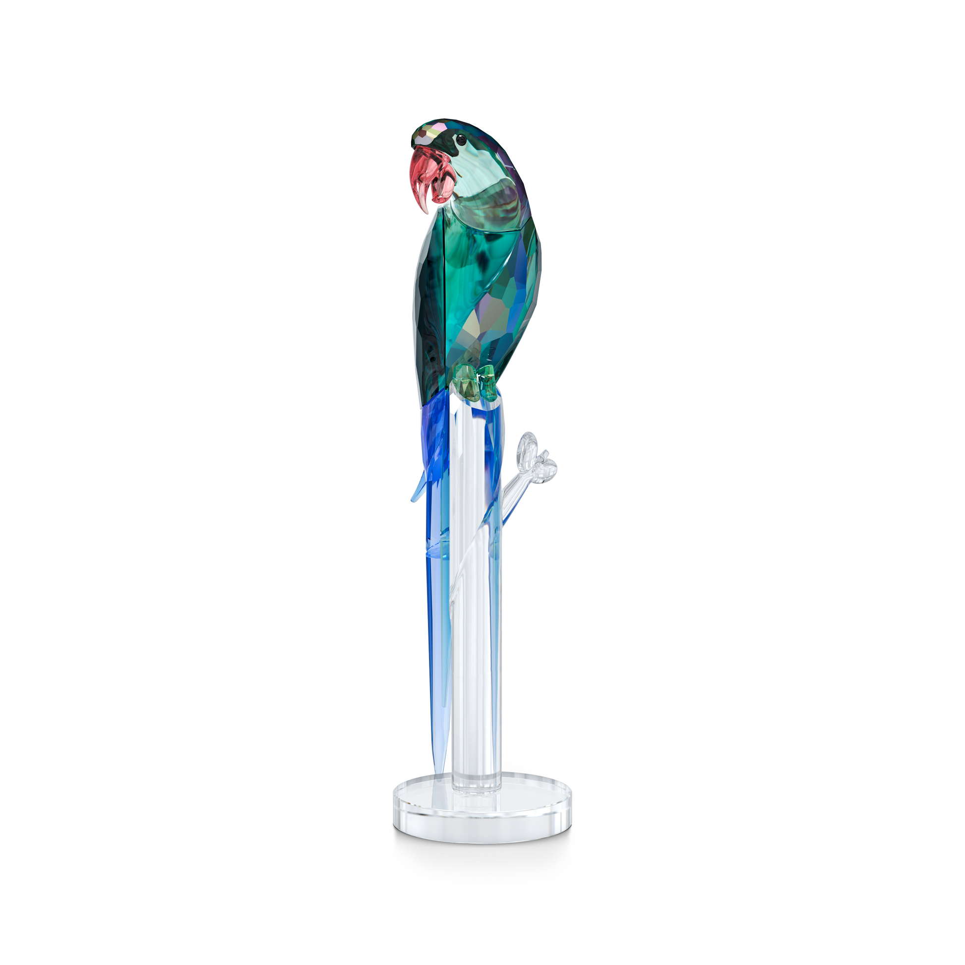 The Swarovski Jungle Beats Green Macaw Banjo Crystal Home Decor is a vibrant creation showcasing a parrot with a green, blue, and pink body perched gracefully on a clear glass stand adorned with intricate branch details. This standout piece, ideal for wildlife enthusiasts, is set against a plain white background.