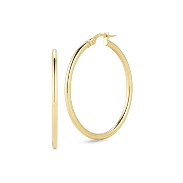 The Roberto Coin Designer 18K Yellow Gold Medium Round Hoop Earrings are shown: one earring is displayed front-on as a circle, the other from the side as a slender vertical line.