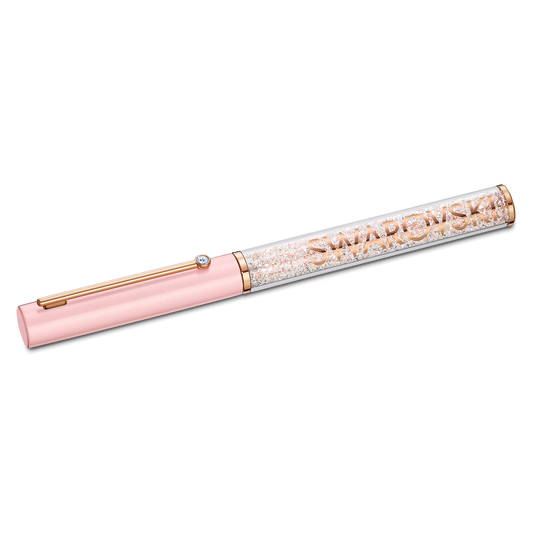 Experience the elegance of the Swarovski Pink Crystalline Gloss Ballpoint Pen, showcasing a sleek rose-pink cap and a clear body adorned with sparkling crystals crafted through the exquisite Crystalline technique. The brand name "Swarovski" is elegantly displayed in gold letters on the pen's body.