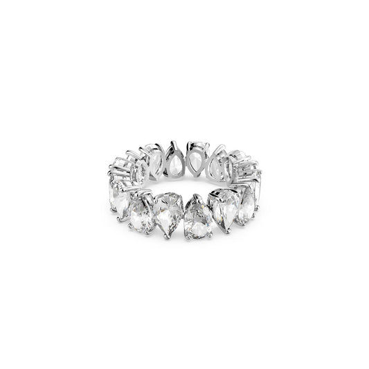 A Swarovski Vittore Drop Cut Ring set against a white background, featuring a series of clear gemstones in an elegant and symmetrical design around the band, embodying the timeless charm of luxury jewelry.