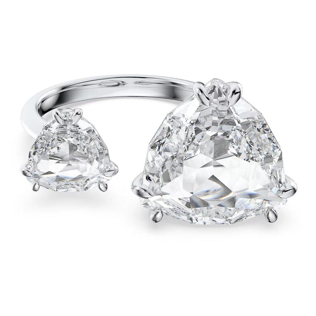 The Swarovski Millenia Open Ring by Swarovski is a stunning piece, featuring a rhodium-plated band with a lustrous silver finish and two large trilliant-cut white crystals. It is beautifully presented against a white background.