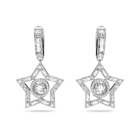 The Swarovski Mixed Cuts Star Stella Drop Earrings feature an elegant design with silver stars accented by a central circular gem and surrounded by small, sparkling stones, all suspended from hoop clasps. These pieces from the Stella collection are displayed against a plain white background and capture the brilliance of Swarovski's iconic star emblem.