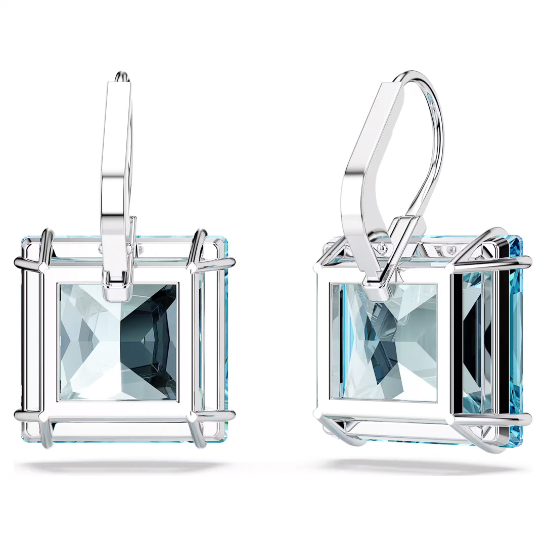 The Swarovski Millenia Drop Earrings feature a modern geometric design with rhodium-plated silver and square-cut aquamarine gemstones. These earrings have intricate settings and secure lever-back clasps, reflecting light to enhance their lustrous appeal.