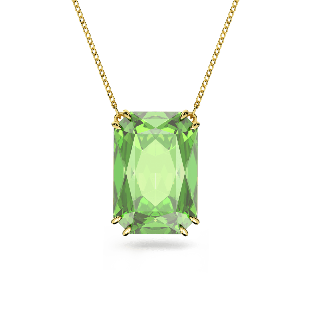 A gold-tone plated Swarovski Millenia pendant necklace showcasing an octagon cut green stone in a four-prong setting, beautifully displayed against a white background. This Swarovski piece embodies timeless sophistication and elegance.