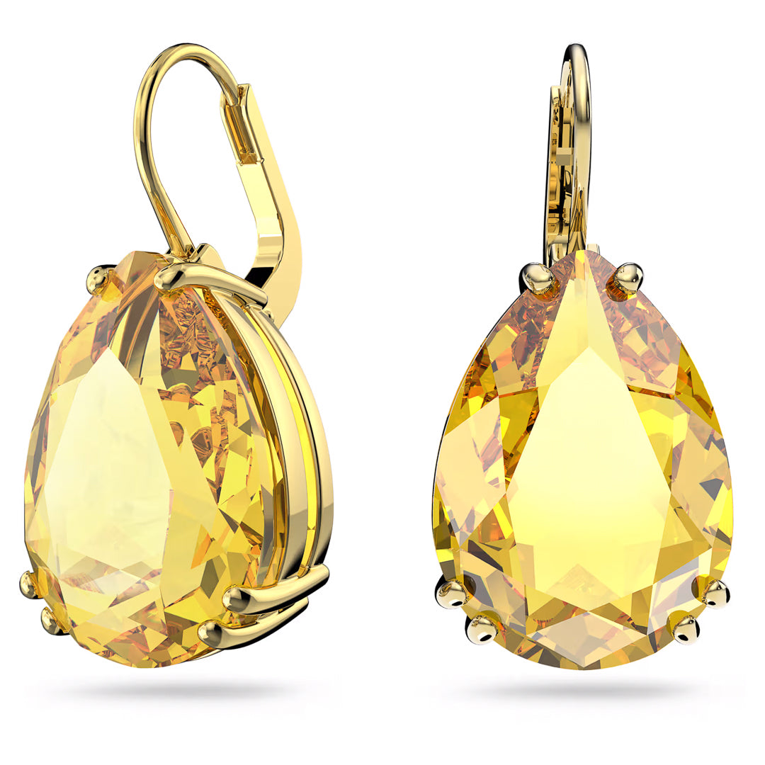 The Swarovski Millenia Drop Earrings showcase stunning pear-cut yellow crystals encased in gold-tone plated metal. These teardrop-shaped earrings are equipped with secure gold lever-back closures, perfectly accentuating the vibrant brilliance of their faceted gems.