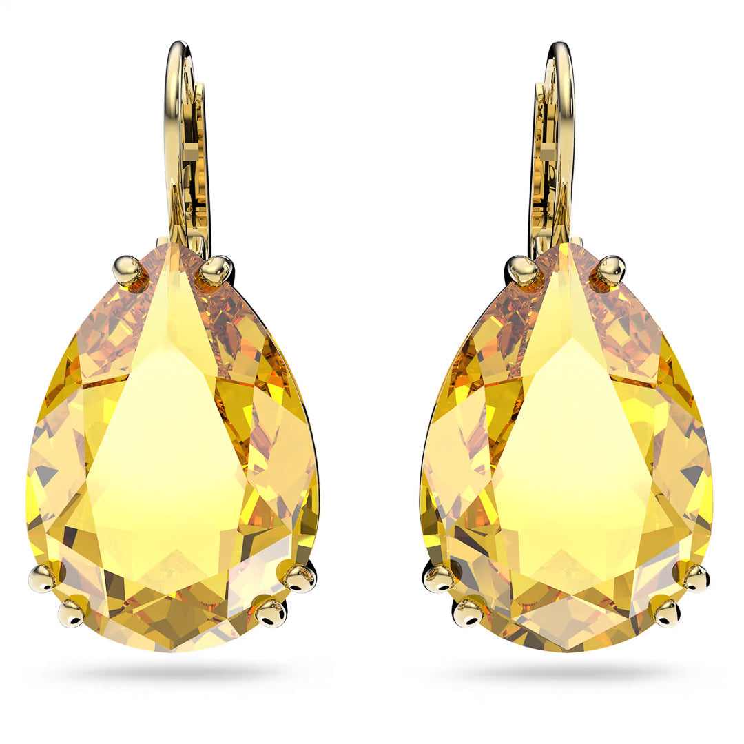 The Swarovski Millenia Drop Earrings are a sophisticated pair featuring large pear-cut yellow crystals set in gold-tone plated metal with lever-back closures. The gemstone facets create a dazzling effect.