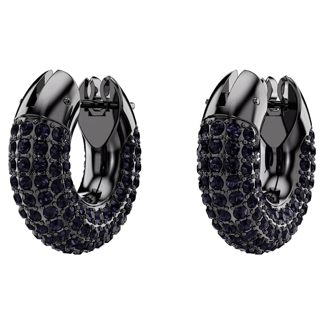 The Swarovski Dextera Hoop Earrings are ruthenium-plated and adorned with dark gemstones. These earrings showcase a sleek, modern design with a reflective, polished finish. They feature closely set Swarovski crystals in multiple rows, adding texture and elegance.